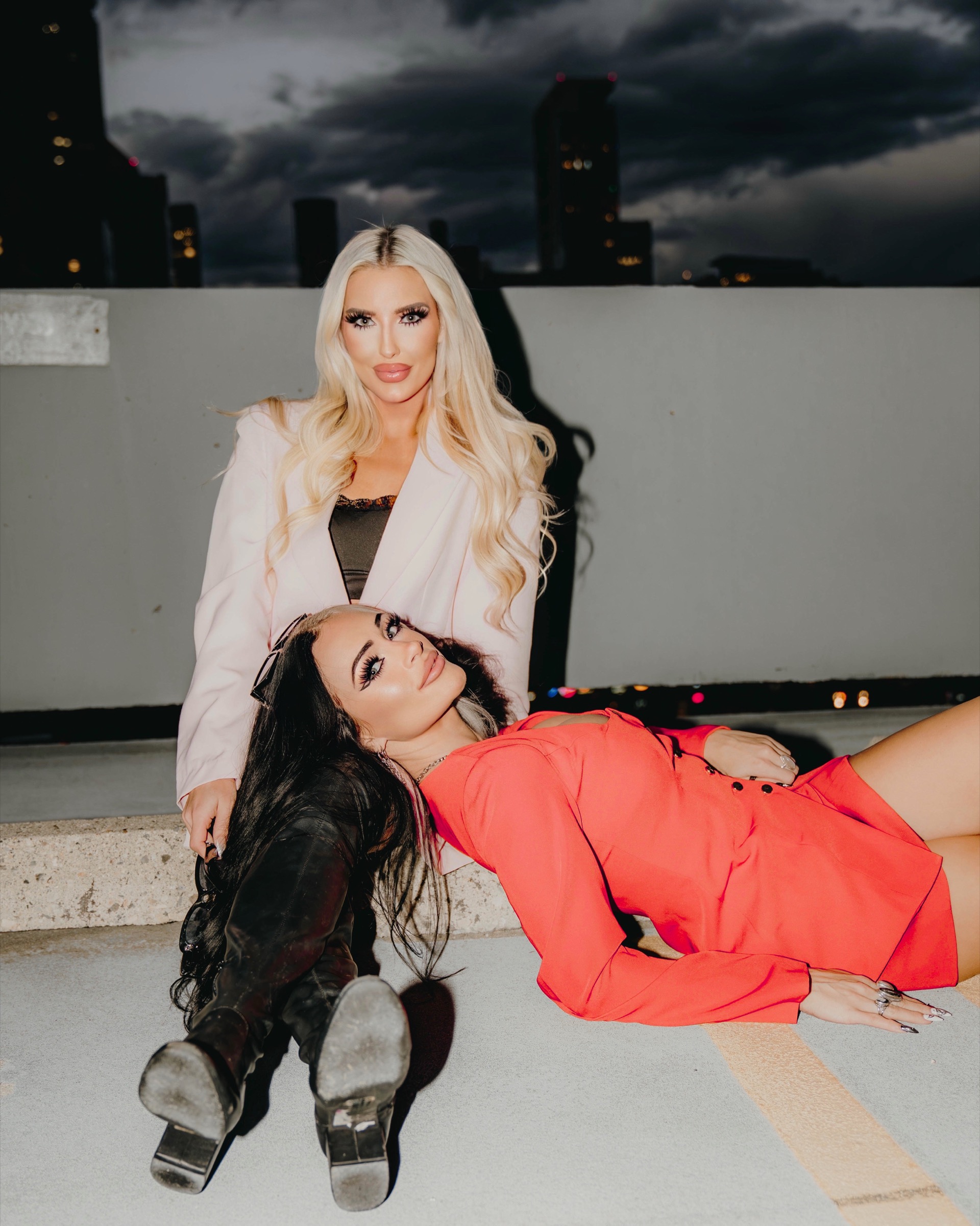 Blaire and Mae in a playful rooftop portrait
